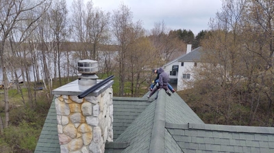 Technician on Roof Photo